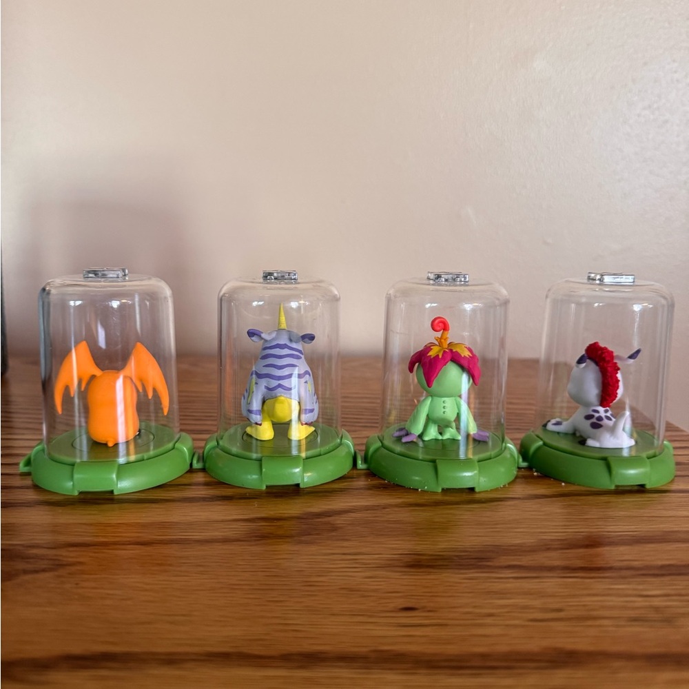 DIGIMON Mini Monsters (4) Plastic Figurines In Domed Containers Zag Toys.BUNDLE